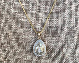 #65 - $650 - 1.2 ct diamond pendant on 10kt gold 3.grams with 18" rope chain 14kt 18" gold rope chain 2.7 gr.