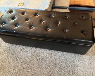 #19 - $60 - Faux leather black tuffed bench with storage.