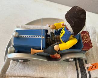 #25 - $58 German Steinbach handcrafted painted man in car 12x9 - music box - working - tiny chip on on dashboard