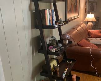 Ladder shelving
Dark brown, wooden
H-6 feet
W-2 ft  D-21”