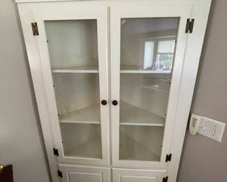 White corner hutch available for purchase sold