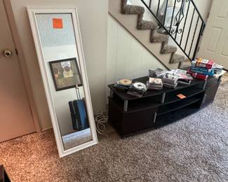 Mirror- $5
Tv table- $35
Misc items, cds, dvd, books