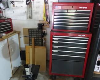Garage completely loaded with stuff including tool chests, tool boxes, hand tools, power tools, garden tools, lawn mowers, trimmers, ladders, compressor, decorations, new sinks in boxes, carts, sleds, snowboards, pails and much more!!