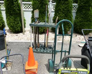Garage completely loaded with stuff including tool chests, tool boxes, hand tools, power tools, garden tools, lawn mowers, trimmers, ladders, compressor, decorations, new sinks in boxes, carts, sleds, snowboards, pails and much more!!