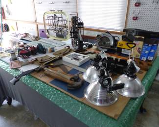 Garage completely loaded with stuff including tool chests, tool boxes, hand tools, power tools, garden tools, lawn mowers, trimmers, ladders, compressor, decorations, new sinks in boxes, carts, sleds, snowboards, pails and much more!!