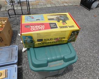 Garage completely loaded with stuff including tool chests, tool boxes, hand tools, power tools, garden tools, lawn mowers, trimmers, ladders, compressor, decorations, new sinks in boxes, carts, sleds, snowboards, pails and much more!!