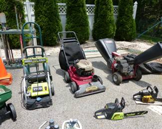 Garage completely loaded with stuff including tool chests, tool boxes, hand tools, power tools, garden tools, lawn mowers, trimmers, ladders, compressor, decorations, new sinks in boxes, carts, sleds, snowboards, pails and much more!!