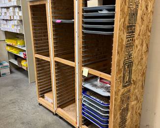 Several ‘Bakers Racks’ also great for organizing anything(quilting fabric etc) tray’s available as well. Trays of Patricia Locke Jewelry.