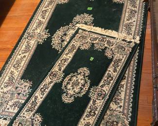 Three rugs (one to the side)