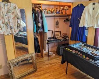 The stained glass on the shelf is amazing.