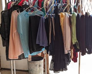 One of three racks of clothes
