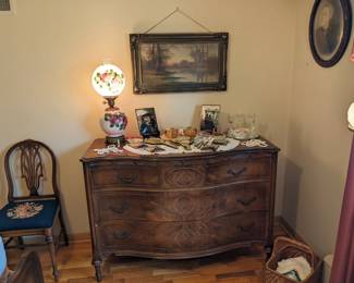 This bedroom set  is in near perfect condition.  This dresser measures 4' 3" X 3' 1" tall and 1' 9" deep.  The set includes two dressers, full sized bed with head and foot board, and nightstand. $650