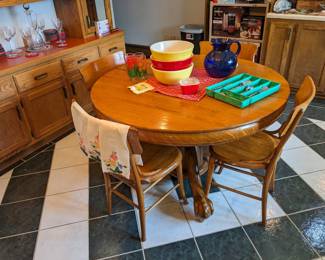 There is one more chair to this unbelievable kitchen table.  Look at those feet! It measures 4' x 2' 6" tall $175 w/five chairs.
