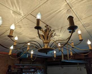 HUGE chandelier in garage!  (bring an electrician)  The width is FIVE FOOT.  It hangs down 1ft 8in.   The price is $1000.