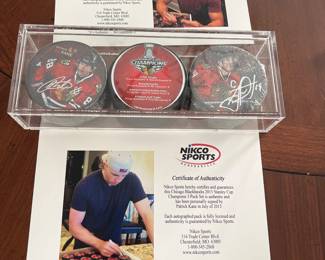 Kane / Toews autographed hockey pucks