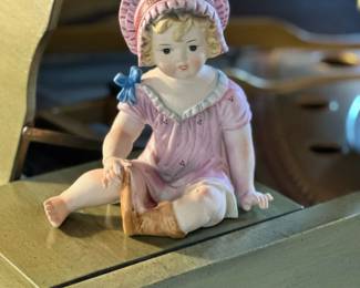 Porcelain Piano Baby Figurine