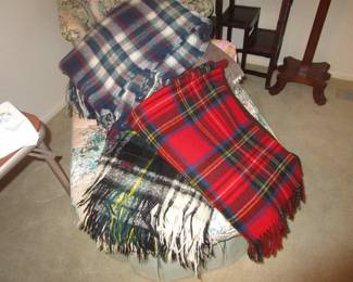 Pile of vintage wool blankets