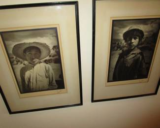 Wall of b/w vintage framed original photos