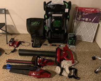 E-GO Battery Operated Lawn Mower w/ Large Battery + Toro Ultra Blower Electric (Corded), Toro Cordless Blower w/ Battery, and Toro Cordless Hedge Trimmer w/ Battery
Toro Cordless Trimmer