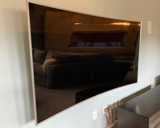 78" Samsung Curved 4K TV. An optional stand for this TV when it is not mounted is included. 