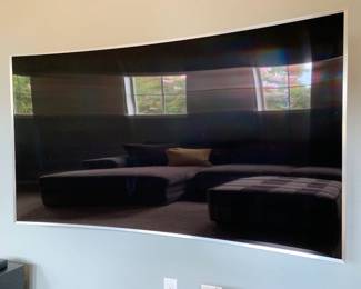 78" Samsung Curved 4K TV. An optional stand for this TV when it is not mounted is included. 