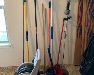 100 Foot Hose on Portable Hose Reel, various cleaning tools.