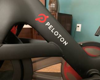 Peloton bike. Upgraded to new screen/processing unit a couple years ago, bike is 1st generation peloton. Includes spare replacement pedals, weights and mat.