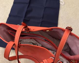 F88 - $50. Dooney & Bourke Medium EastWest Tote. 