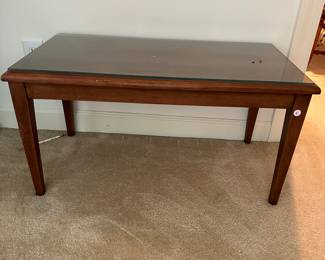 F142 - $30 - Glass Top Coffee table. 32" wide, 17" deep, 17" tall.