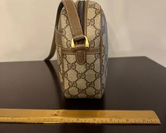 J59 - $325 Vintage Gucci Crossbody Logo Bag. 