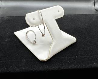 L9 - $75. Ed Levin Sterling. Hangs 1.25". 