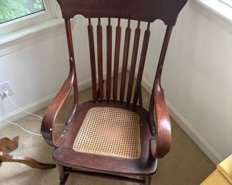 F114 - $40 - Rocking chair. Caning needs repair.