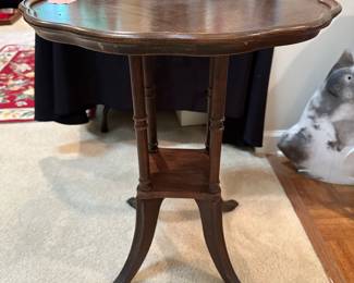 F50 - $45 pie crust side table. Measures 22" wide by 26" tall. Wiggly