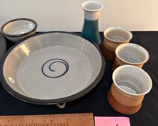  F34 - Pringle pottery. Left to right. $8 Small bowl, $20 Pie plate wall hanging, $10 vase, $15 for set of 3 mugs.