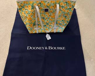 F89 - $40. Dooney & Bourke Tote - has minor scuffs on white handles. 
