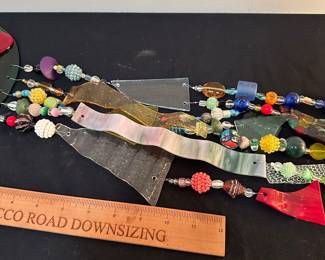 F44 - $40 signed "Susan BE" Art glass wind chime. Needs repair to hanger.