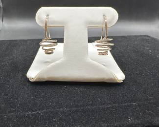 L5 - $110. Ed Levin Sterling. Hangs 1 1/8". 