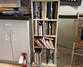 F60 - $40 - Bookcase Measures 18" wide by 11" deep by 47" tall. 2 shelves are movable.