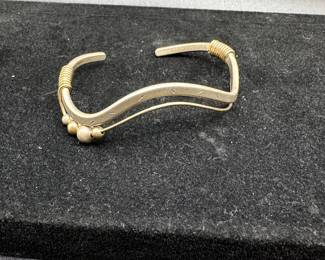 J61 - $45. Sterling Wavy Curved Cuff Bracelet stamped "CEB"