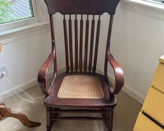 F114 - $40 - Rocking chair. Caning needs repair.