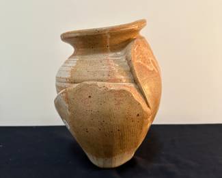 F30 - $25 Howe signed pottery vase. Can lay on it's side or stand. 