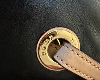 F94 - $50. Michael Kors shows minor wear on handles. 