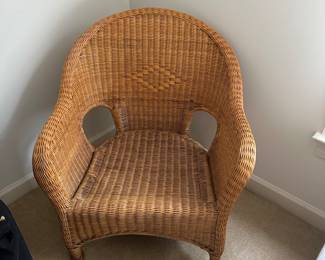 F131 - $45 - Wicker chair. 29" wide, 28" deep, 15.5" to seat, 33" to back.