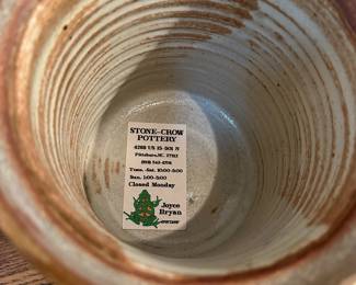 F9 - $25 Lidded canister by Stone Crow Pottery. Measures 10" tall. 