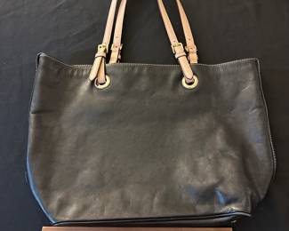 F94 - $50. Michael Kors shows minor wear on handles. 