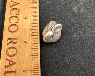 J55 - $10. Sterling Rabbit Charm. 
