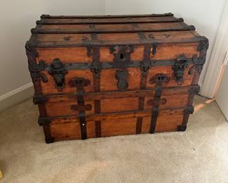 F118 - $95 - Antique Trunk. Measures 32" wide, 19.5" deep, 23.5" tall.