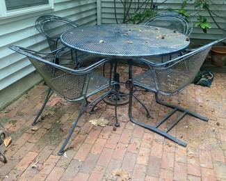 F164 - $150. Iron Table & 4 chairs with umbrella stand. Measures 47.5" round x 28" tall. 2 bouncy chairs - 2 regular. Does have minor surface rust and would benefit from a coat of paint. All pieces are sturdy & useable. 