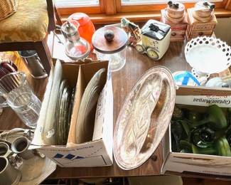 Pitchers, platters, green glass