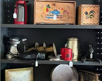 Kitchen storage, tins, juicer.  Cute wooden bread box and canister.
